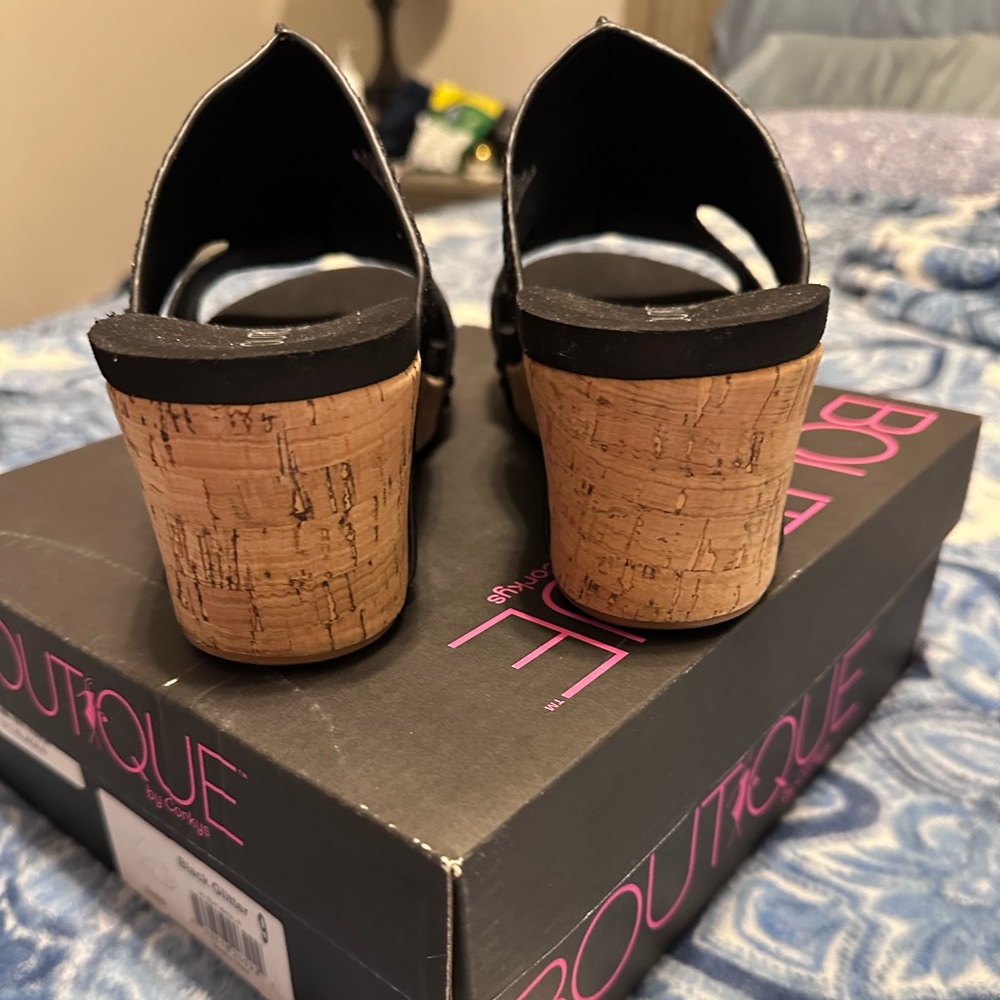 Brand new in box. Really cute Corky Black little wedges.